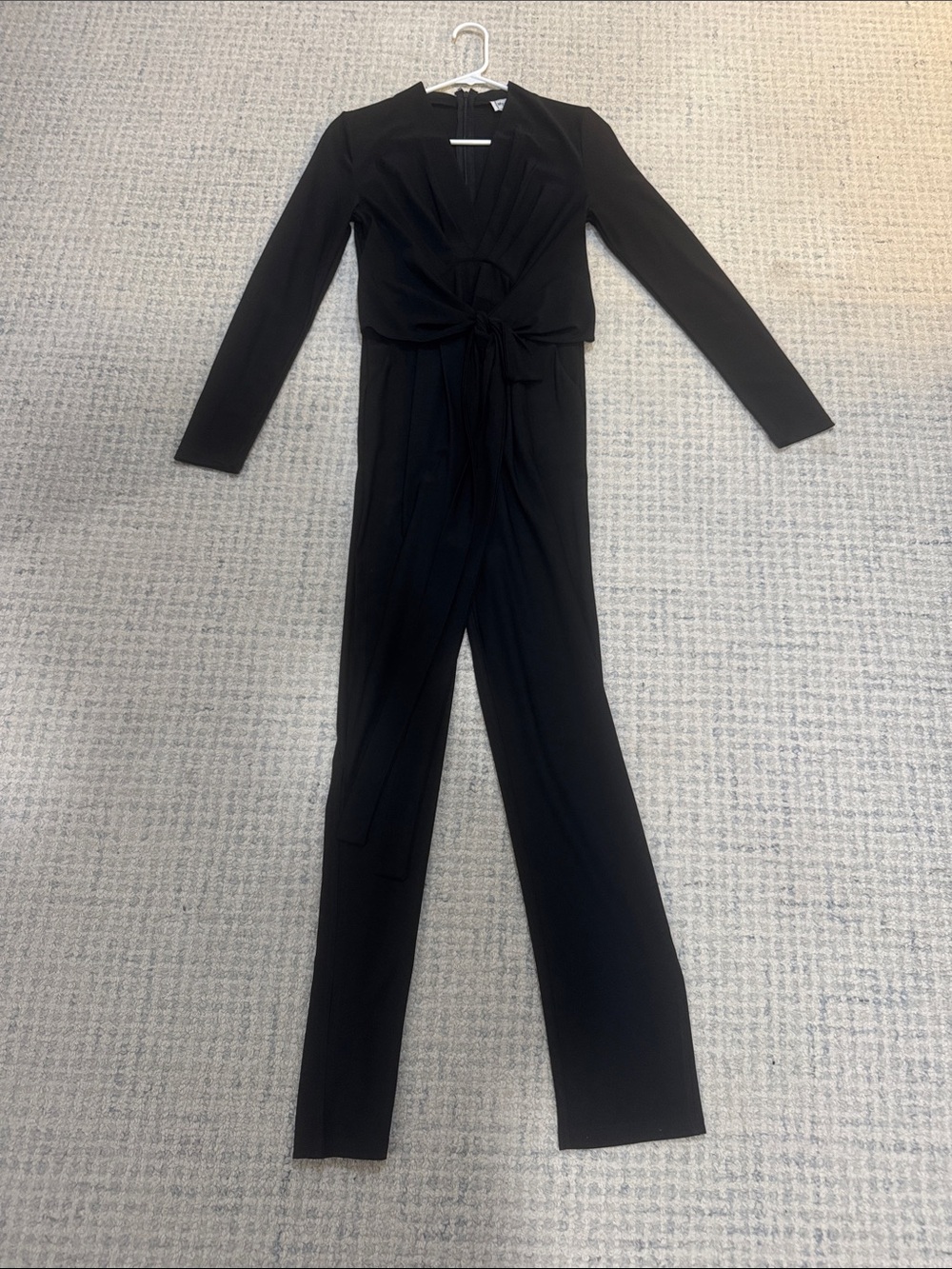 Elegant Black Long-Sleeve Wrap Jumpsuit with Self-Tie Waist